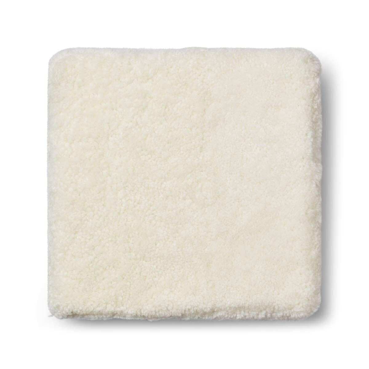 Pouf en peau de mouton bouclée | Laine courte Ivoire