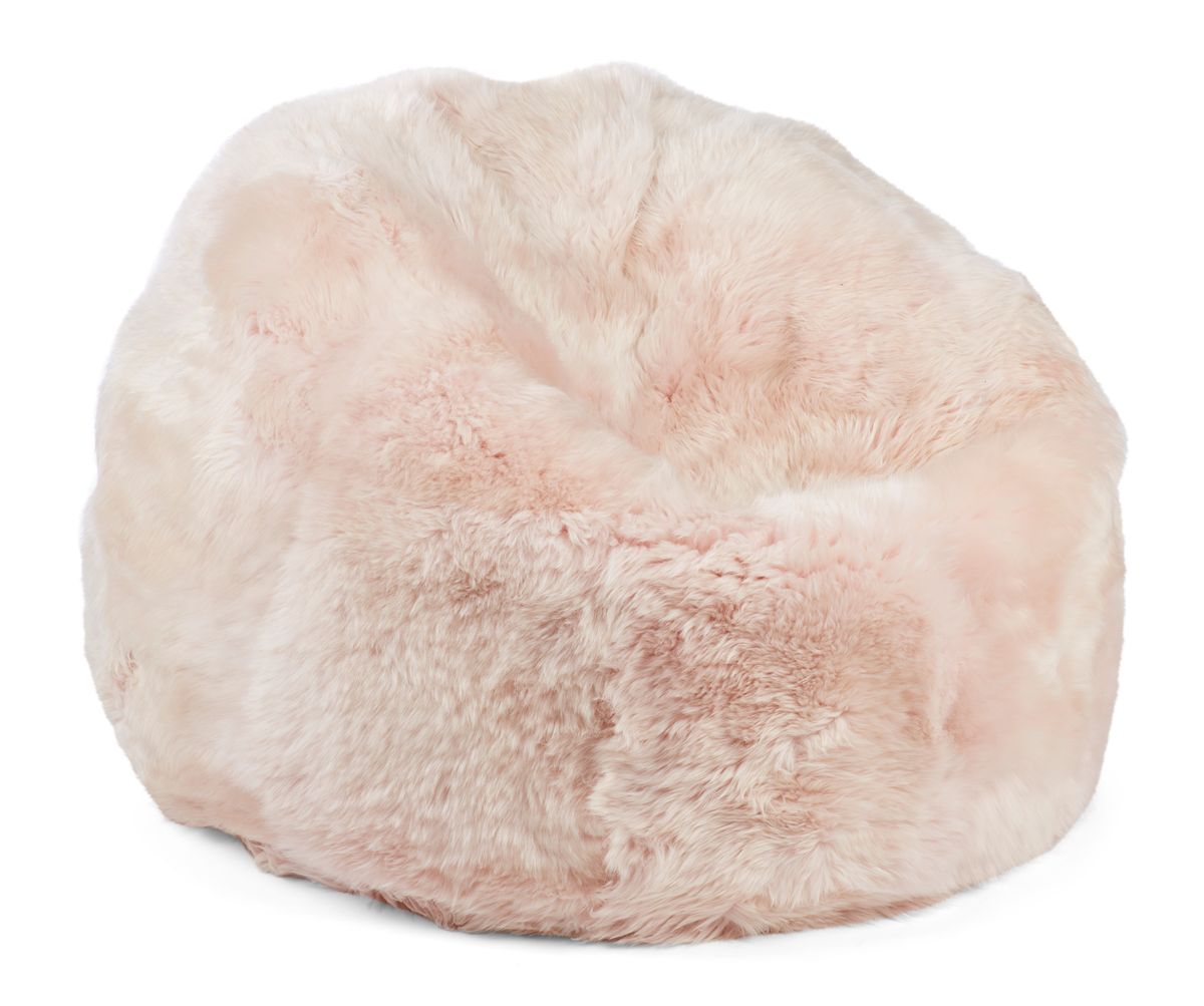 Pouf rond en peau de mouton à laine longue Rose