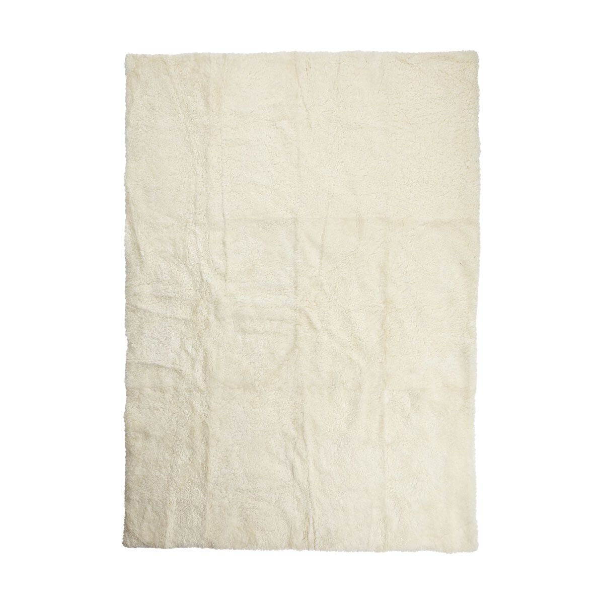 Tapis design en peau de mouton bouclée à laine courte Ivoire