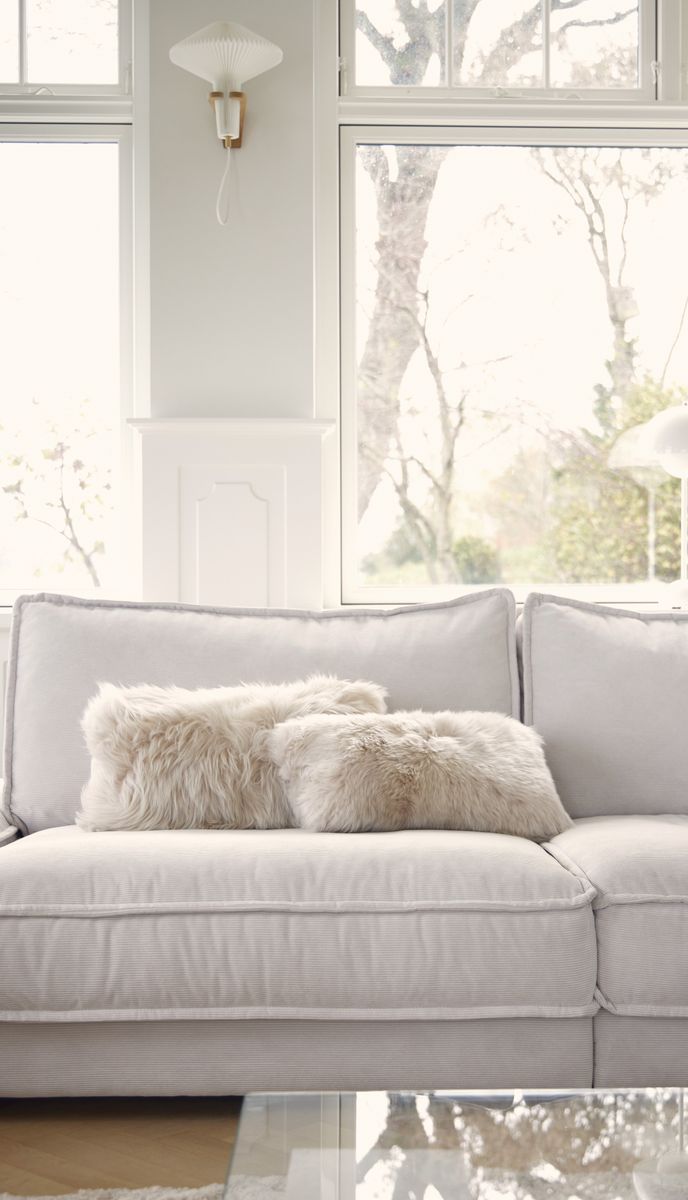 Coussin en peau de mouton longue laine Linge