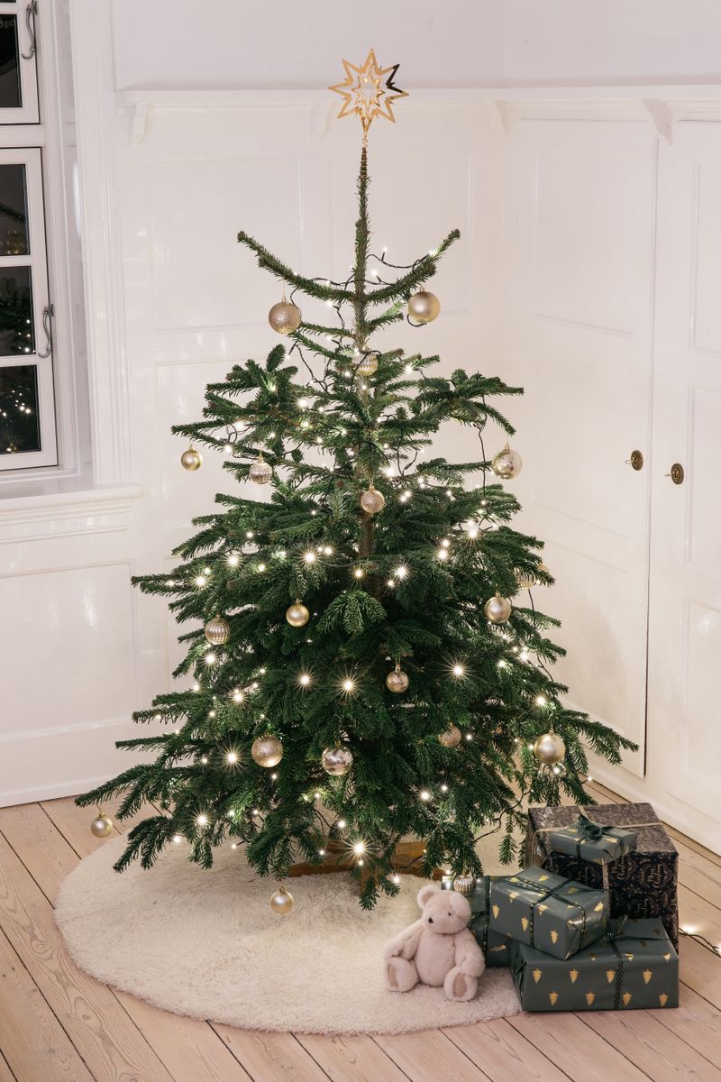 Tapis design en peau de mouton bouclée à laine courte Ø140 cm Perle