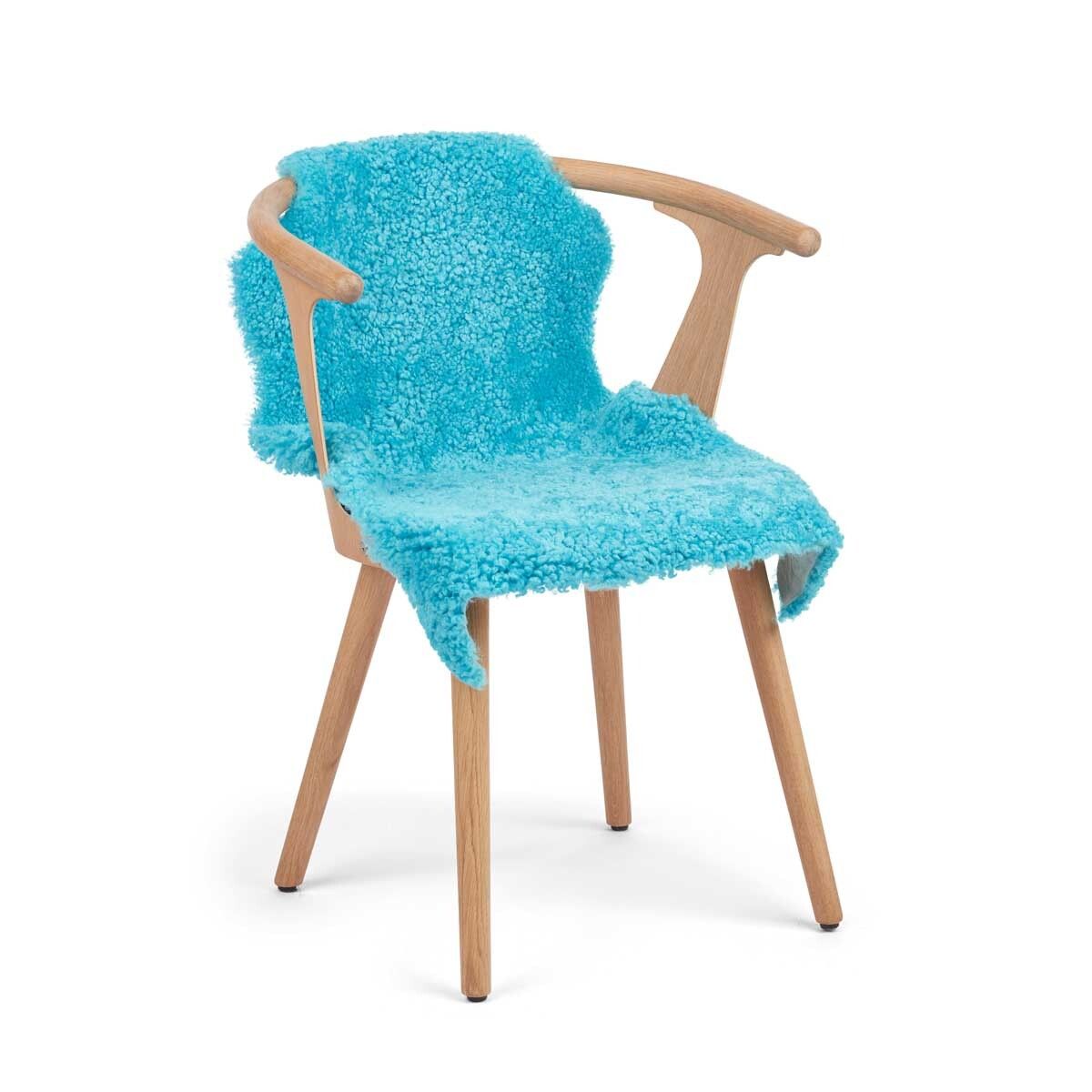 Peau de mouton courte en laine 90 cm Paon corail