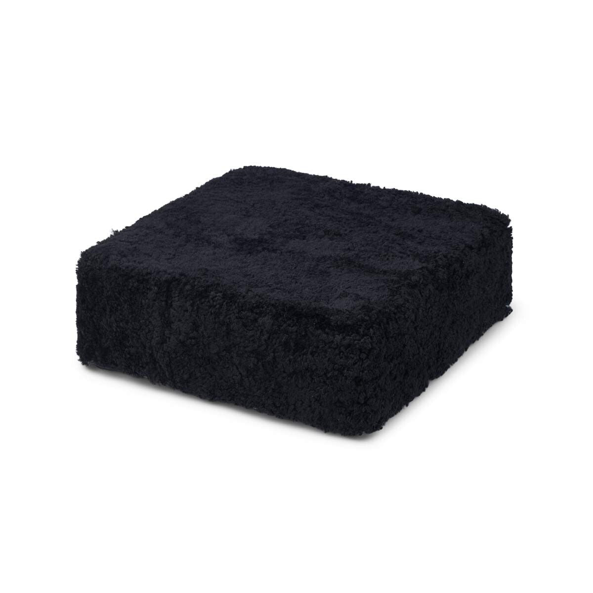 Pouf en peau de mouton bouclée | Laine courte