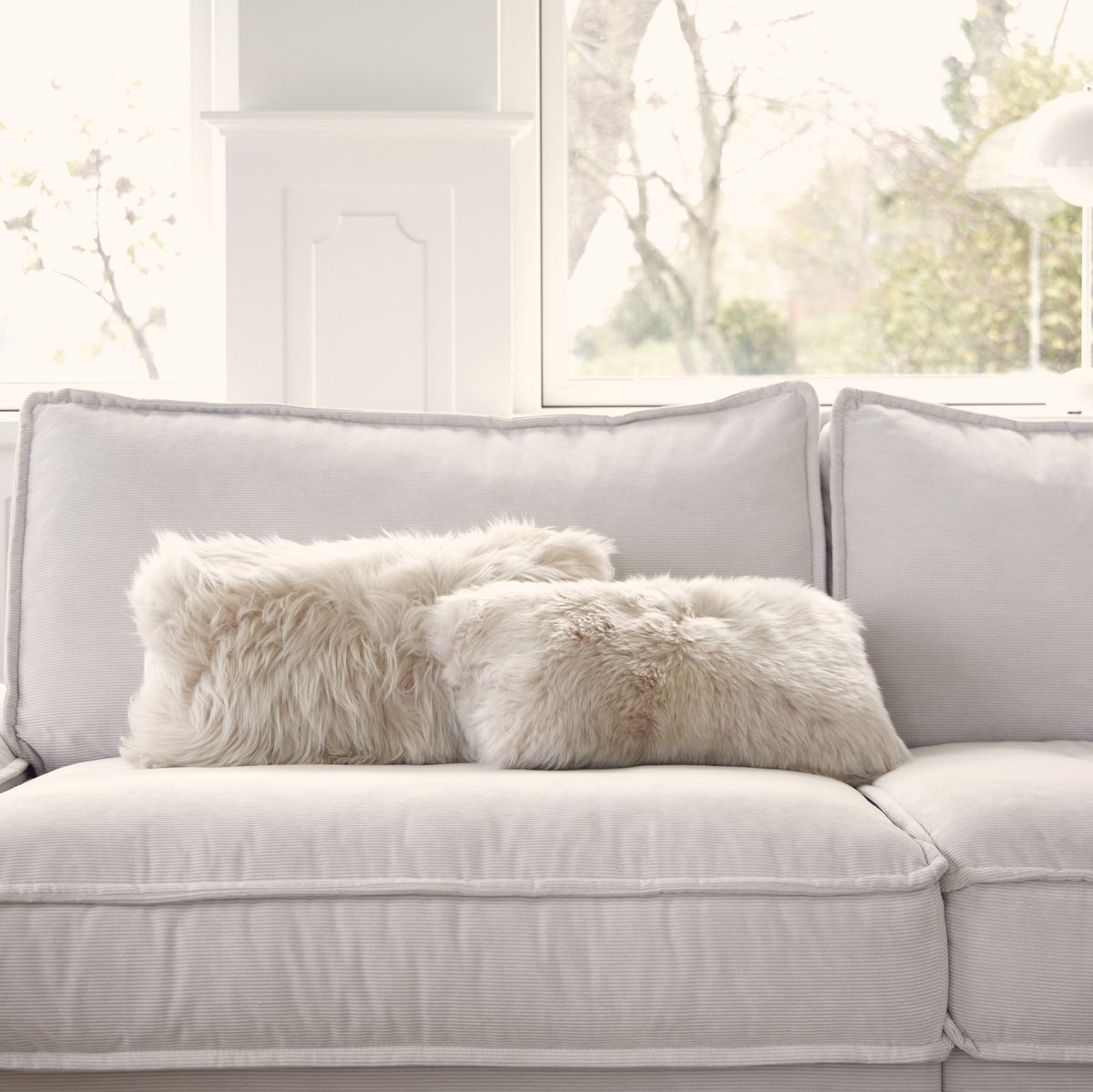Coussin en peau de mouton longue laine Noir