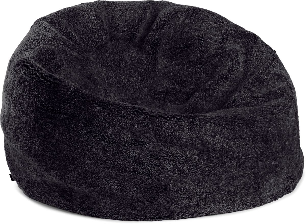 Pouf rond en peau de mouton à laine courte Noir