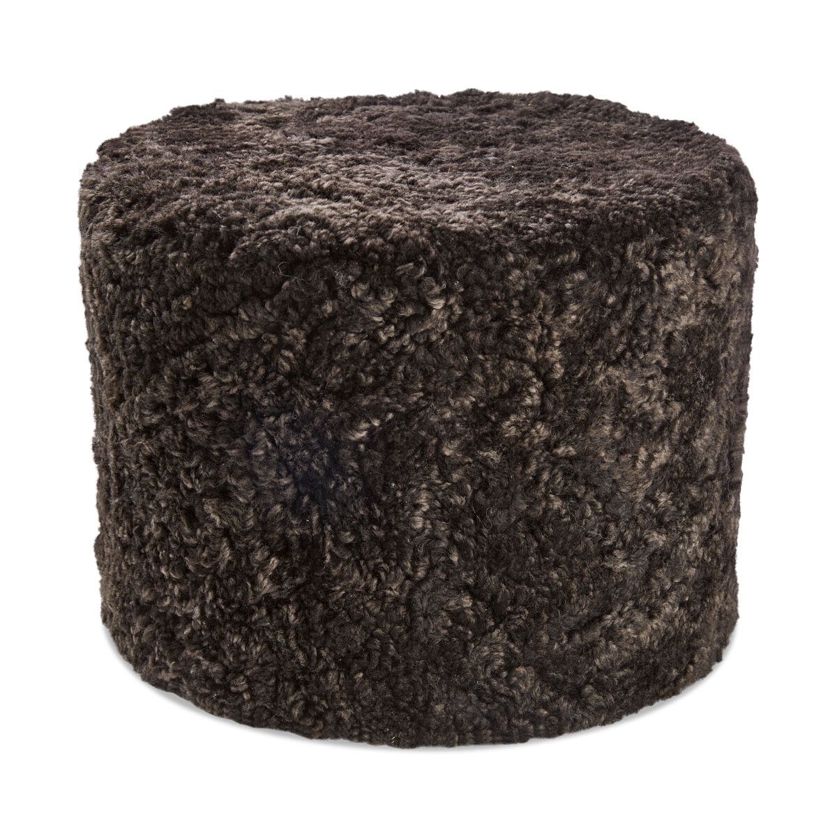 Pouf court en laine bouclée de mouton