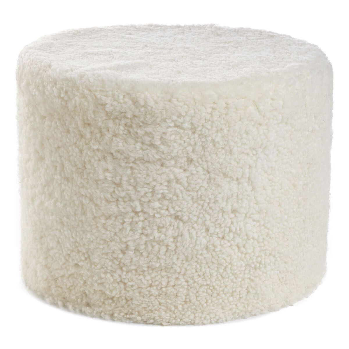 Pouf court en laine bouclée de mouton