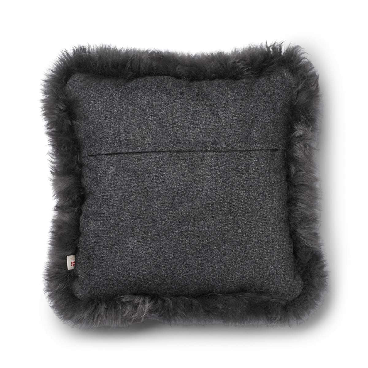 Coussin en peau de mouton longue laine Roche/acier