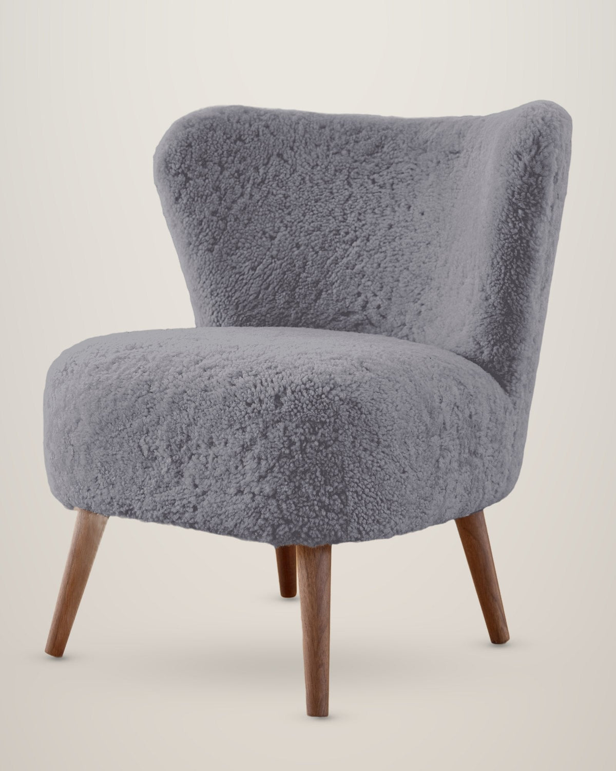 Fauteuil en peau d’agneau à poils courts – Gris clair