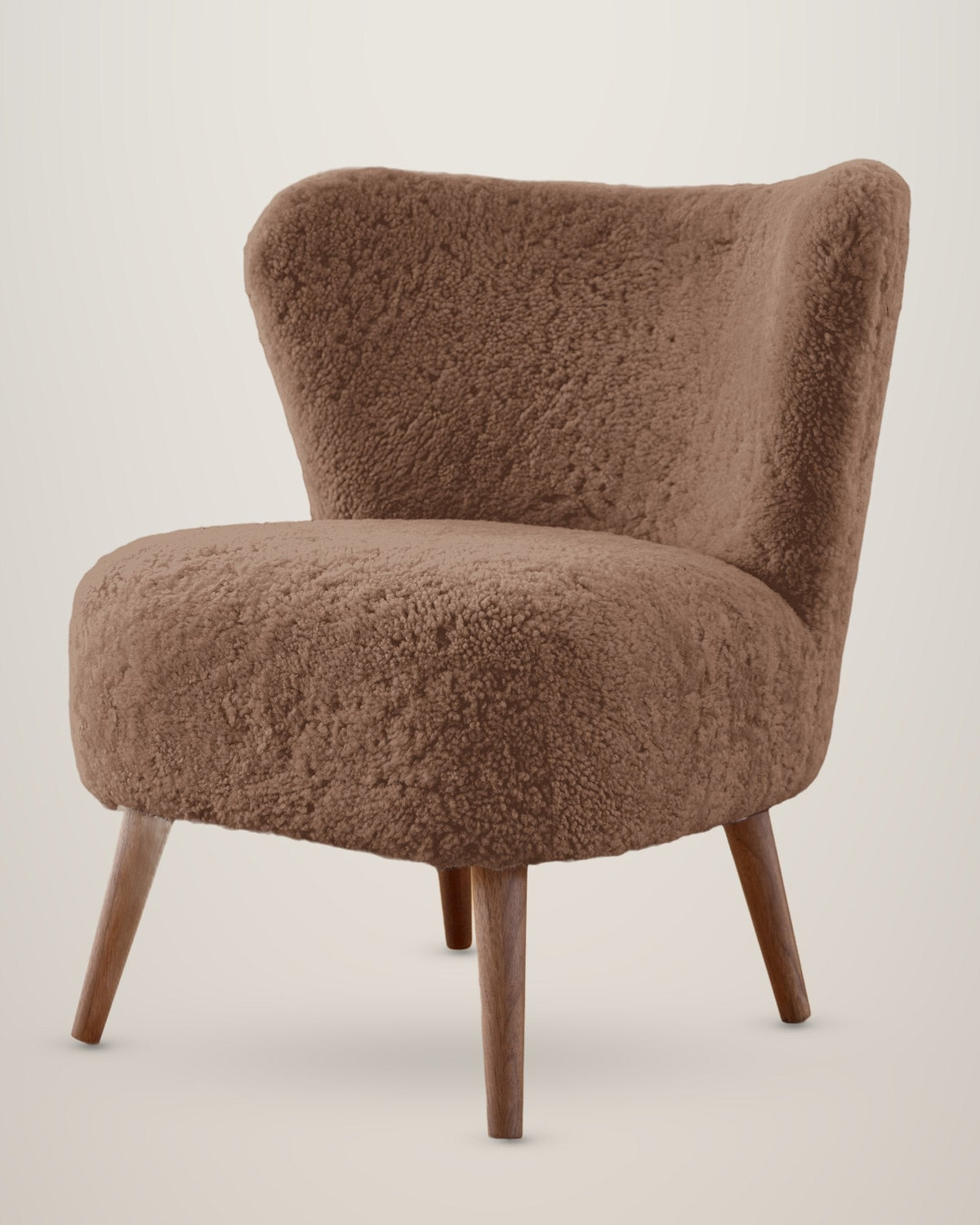 Fauteuil en peau d’agneau à poils courts – Taupe